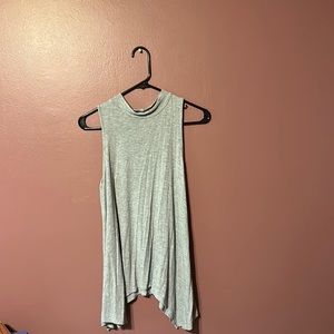 Grey, high neck, flowing sides tank top.